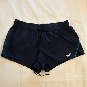 black athletic shorts with blue detail